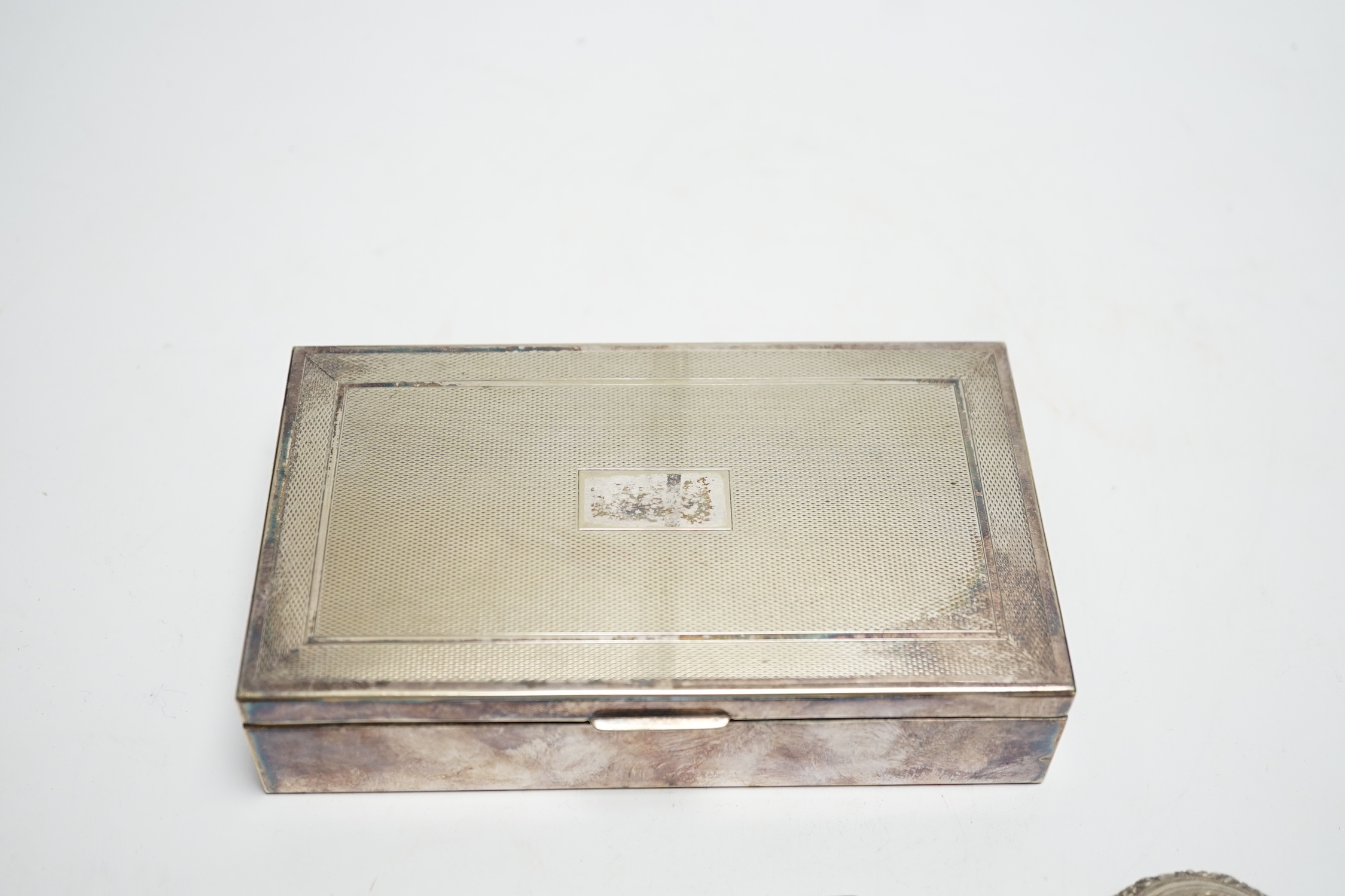 A George VI silver and guilloche enamel cigarette case, Birmingham, 1939, 93mm, a silver mounted cigarette box and two other small boxes including enamelled 'shell' box(a.f.).